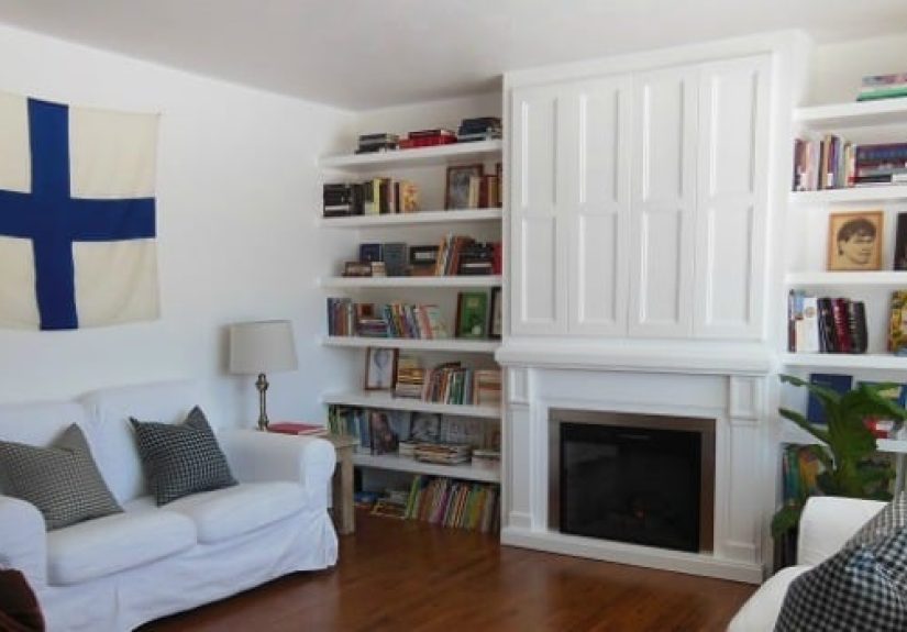 Built-In Fireplace Surround and Shelving with Hidden TV Nook